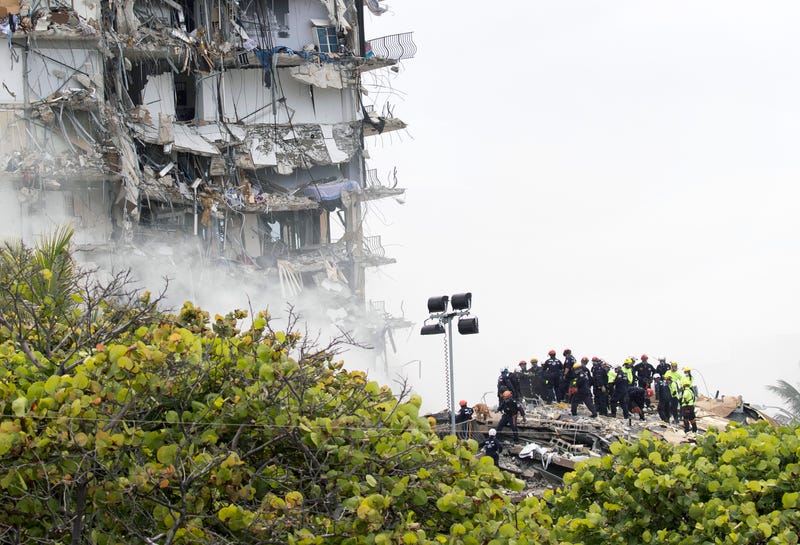 Search and rescue teams look for survivors in the collapsed Florida condo building.