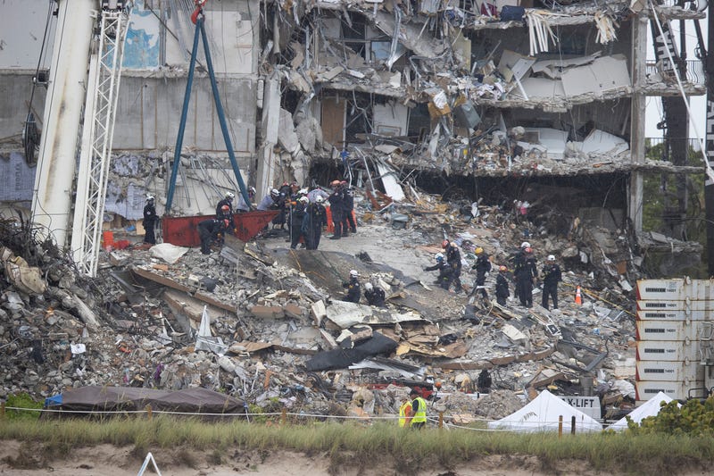 Search and rescue teams look for possible survivors in Surfside, Fla.