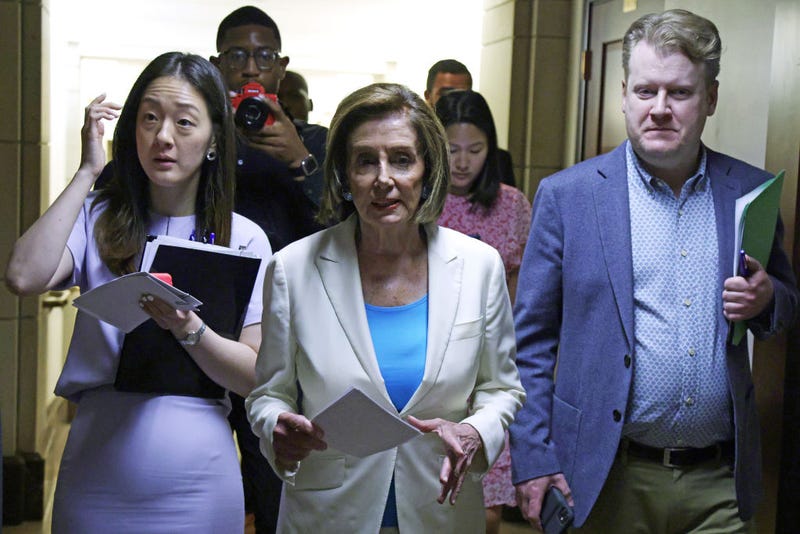 U.S. Speaker of the House Rep. Nancy Pelosi (D-CA) (C) leaves with Deputy Chief of Staff Drew Hammill (R) and Press Secretary Joy Lee (L) after a weekly news conference at the U.S. Capitol July 1, 2021 in Washington, DC.