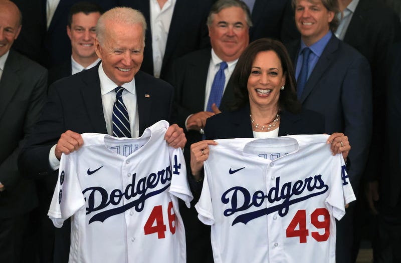 U.S. President Joe Biden and Vice President Kamala Harris pose with the jerseys given to them by the 2020 World Series champion Los Angeles Dodgers during a congratulatory event in the East Room of the White House on July 02, 2021 in Washington, DC.