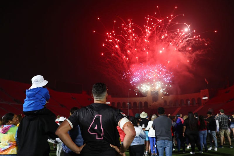 Dave Dennis #4 of the LA Giltinis watches the fireworks show after the game against NOLA Gold at Los Angeles Coliseum on July 04, 2021 in Los Angeles, California. This year's weekend had the second highest pollution levels for Independence Day in the last decade.(Photo by Meg Oliphant/Getty Images for LA Giltinis)