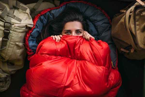 Woman sleeping in sleeping bag