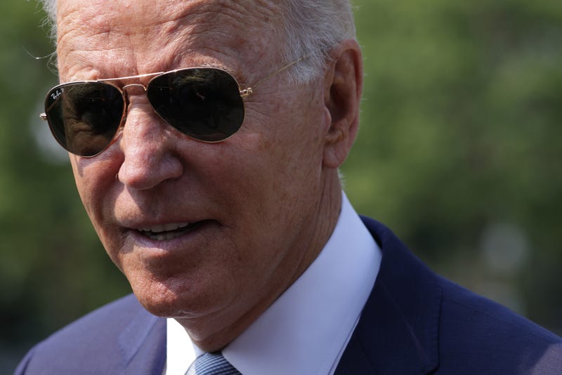 President Joe Biden speaks to press before boarding Marine One.