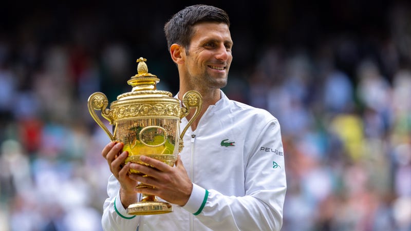 Novak Djokovic celebrates his Wimbledon title.