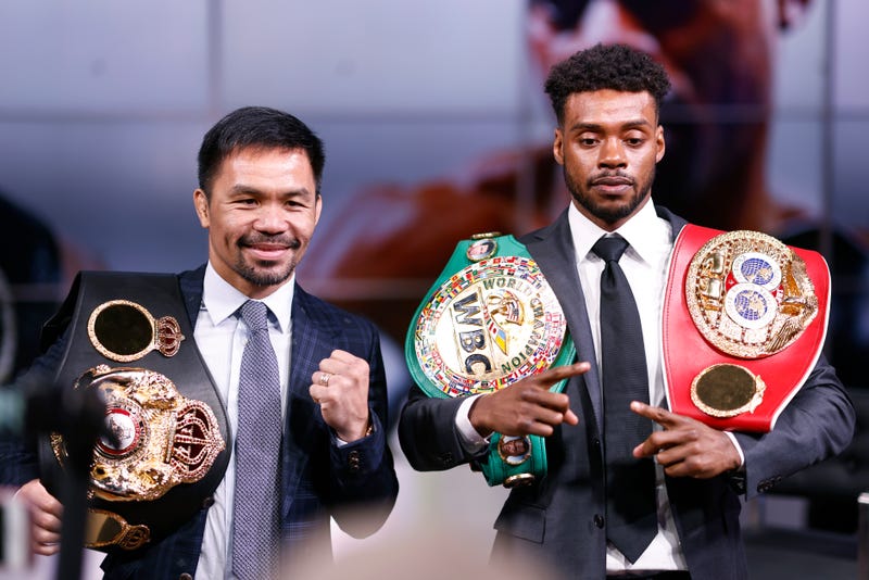Manny Pacquiao and Errol Spence Jr pose for the media following their press conference at Fox Studios on July 11, 2021 in Los Angeles, California.