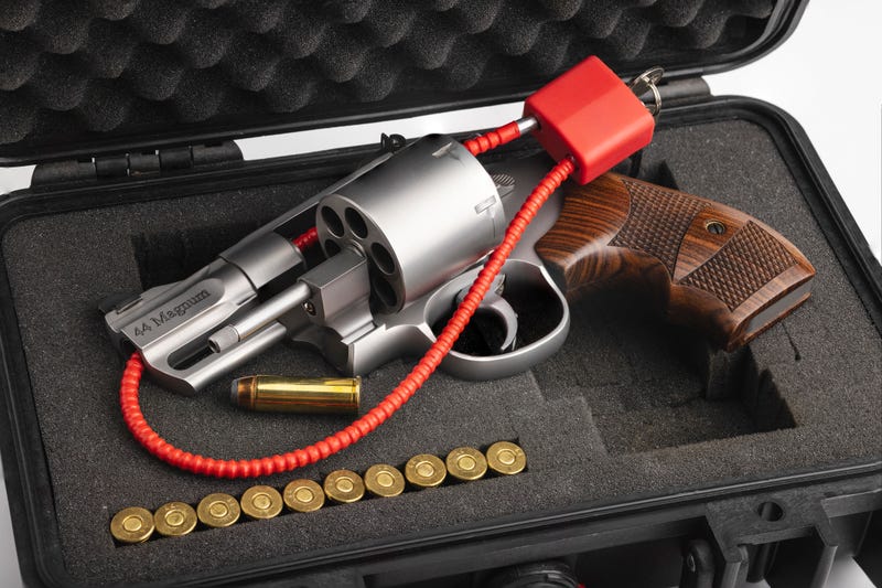 Gun with a lock.