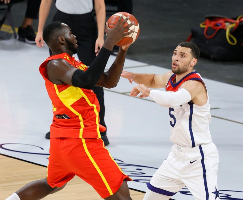 Usman Garuba #16 of Spain catches a pass under pressure from Zach LaVine #5 of the United States during an exhibition game at Michelob ULTRA Arena ahead of the Tokyo Olympic Games on July 18, 2021 in Las Vegas, Nevada. The United States defeated Spain 83-76.