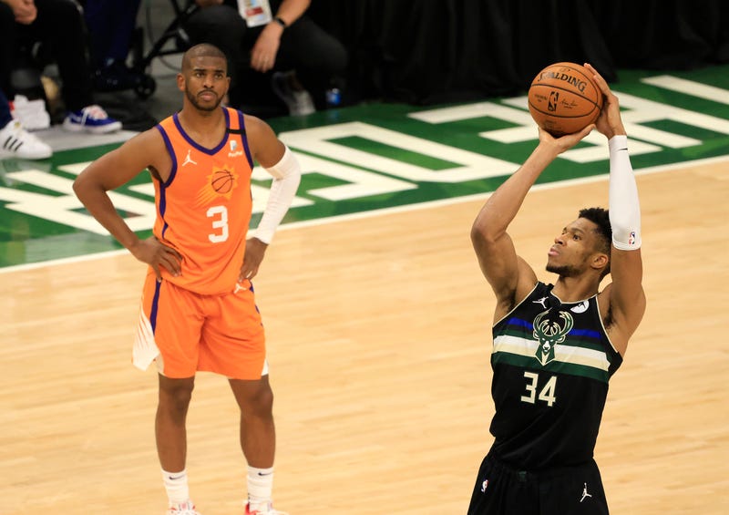 Suns star Chris Paul and Bucks star Giannis Antetokounmpo.