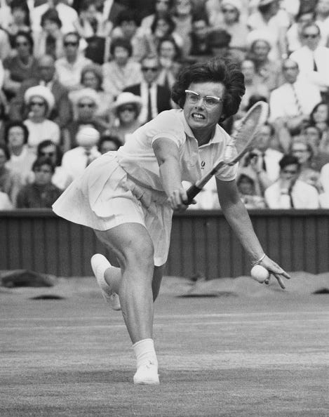 Billie Jean Moffitt of the United States looks at the tennis ball while playing a back hand return to Elizabeth Starkie of Great Britain during their Women's Singles Second Round match at the Wimbledon Lawn Tennis Championship on 24th June 1965