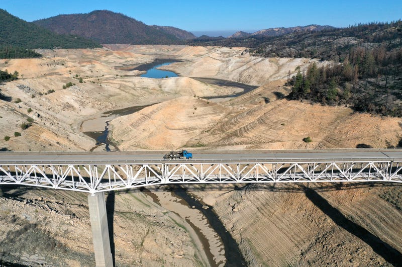 In an aerial view, the Enterprise Bridge crosses over a section of Lake Oroville that was previously underwater on July 22, 2021 in Oroville, California.