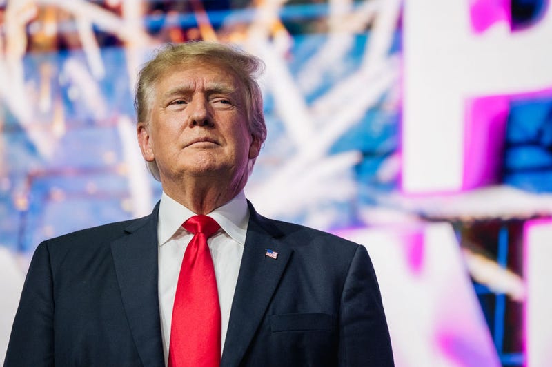 Former U.S. President Donald Trump makes an entrance at the Rally To Protect Our Elections conference on July 24, 2021 in Phoenix, Arizona.