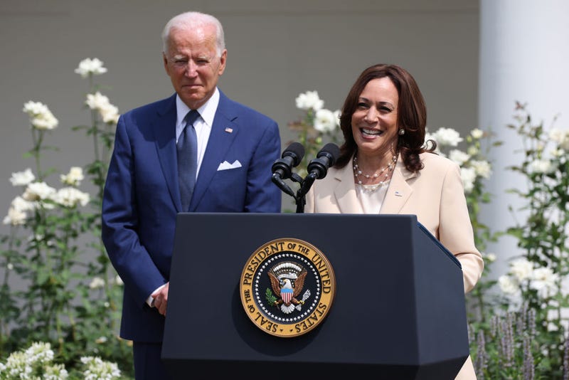 U.S. Vice President Kamala Harris delivers remarks as U.S. President Joe Biden looks on in the Rose Garden of the White House on July 26, 2021 in Washington, D.C.
