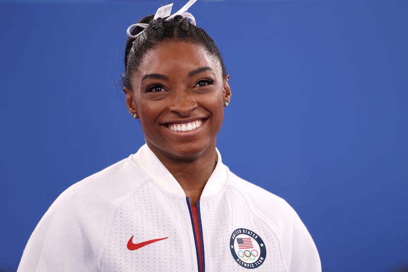 Simone Biles of Team United States smiles during the Women's Team Final on day four of the Tokyo 2020 Olympic Games at Ariake Gymnastics Centre on July 27, 2021 in Tokyo, Japan.