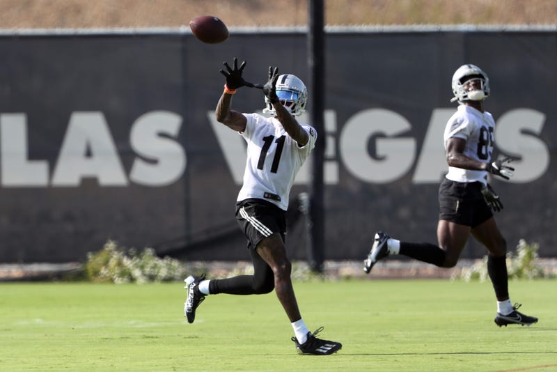 WR Henry Ruggs III catches a pass during a Las Vegas Raiders' practice