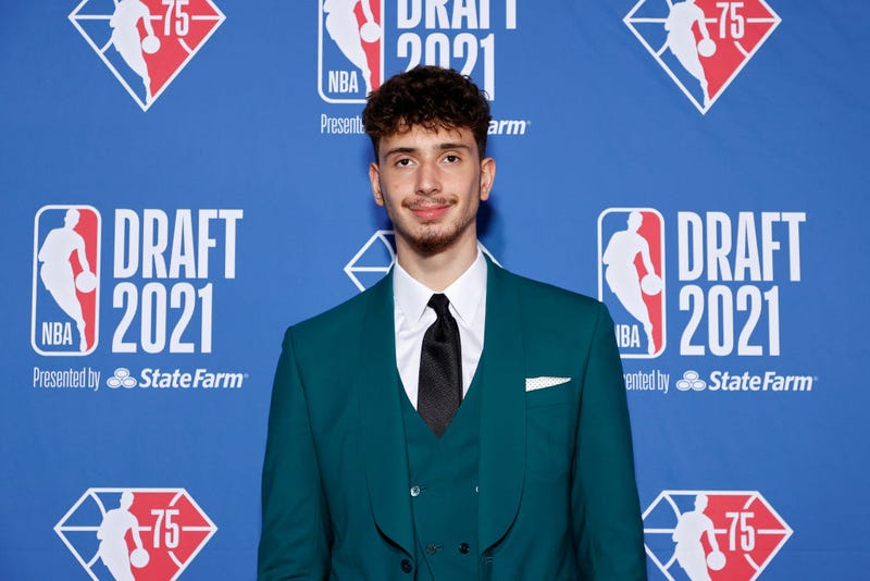 Alperen Sengun poses for photos on the red carpet during the 2021 NBA Draft at the Barclays Center on July 29, 2021 in New York City.