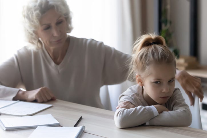 Grandma scolding granddaughter