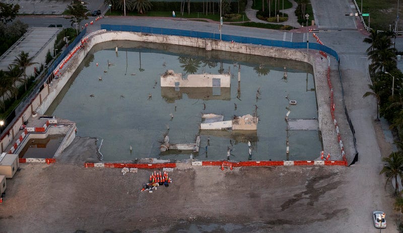 In this aerial view, the cleared lot that was where the collapsed 12-story Champlain Towers South condo building once stood on July 31, 2021 in Surfside, Florida. A total of 98 people died when the building partially collapsed on June 24, 2021. 