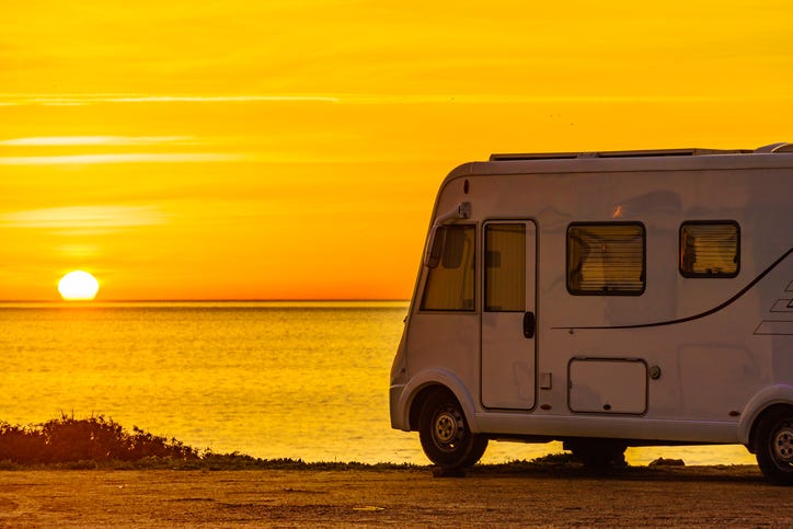 Camper rv at sunrise on mediterranean coast Costa del Sol, Andalucia Spain