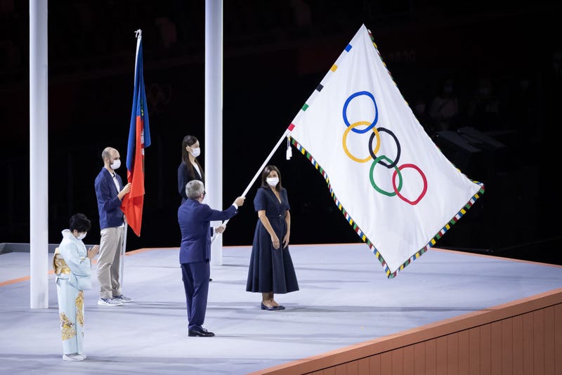 Mayor of Paris, Anne Hidalgo receives the olympic flag from President of the International Olympic Committee, Thomas Bach during the Closing Ceremony of the Tokyo 2020 Olympic Games at Olympic Stadium on August 08, 2021 in Tokyo, Japan.