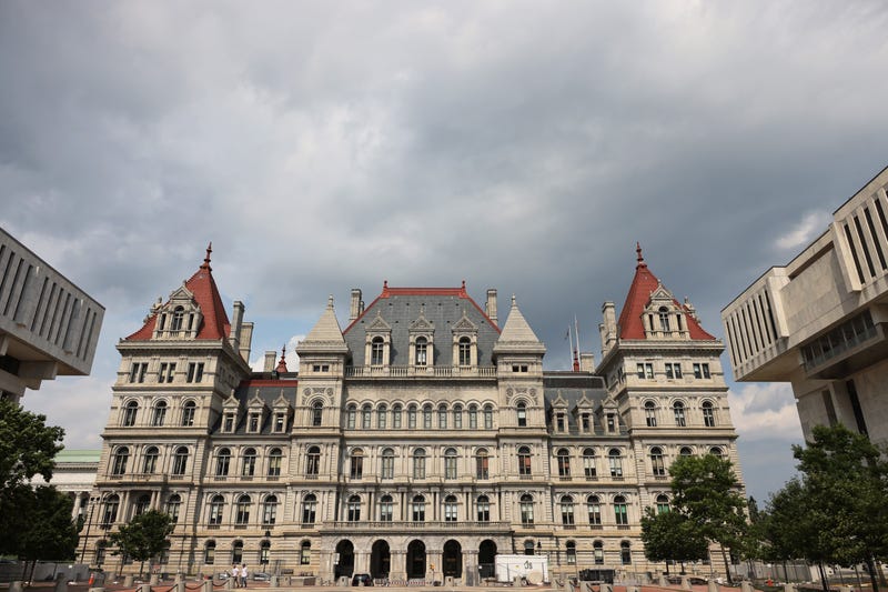 The New York State Capitol building on August 11, 2021 in Albany, New York (center), next to the state Appellate court building (right).