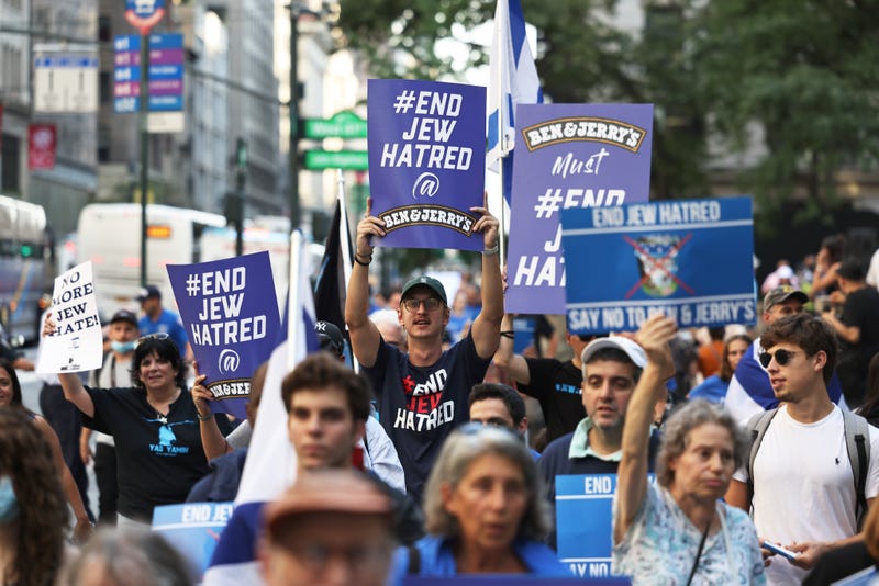 Protesters march against Ben & Jerry's Ice Cream near the New York Public Library on August 12, 2021 in New York City
