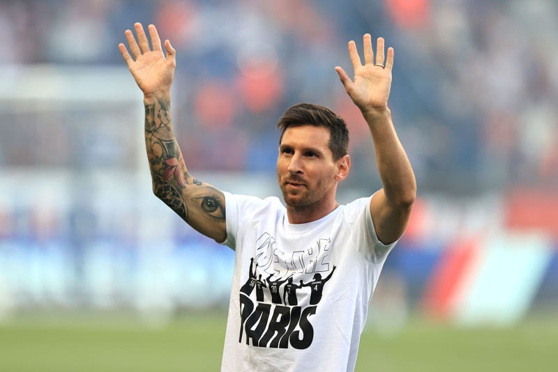 Lionel Messi of Paris Saint-Germain acknowledges the fans as he is introduced to the fans prior to the Ligue 1 Uber Eats match between Paris Saint Germain and Strasbourg at Parc des Princes on August 14, 2021 in Paris, France.