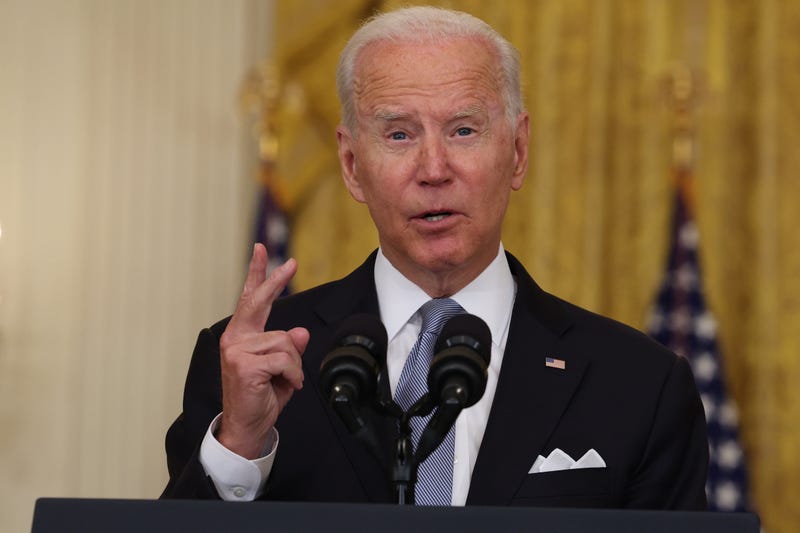 President Joe Biden gestures as he gives remarks at the White House on August 16.