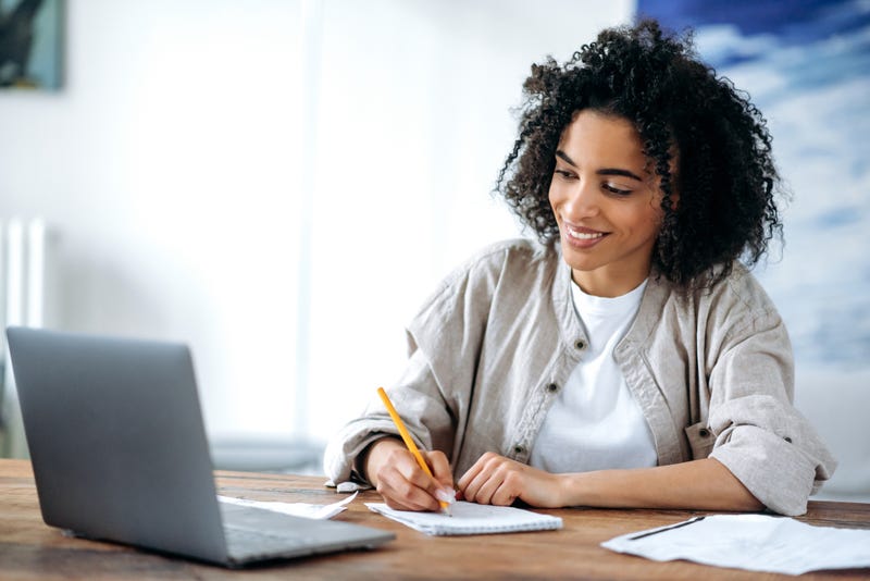 woman taking an online course