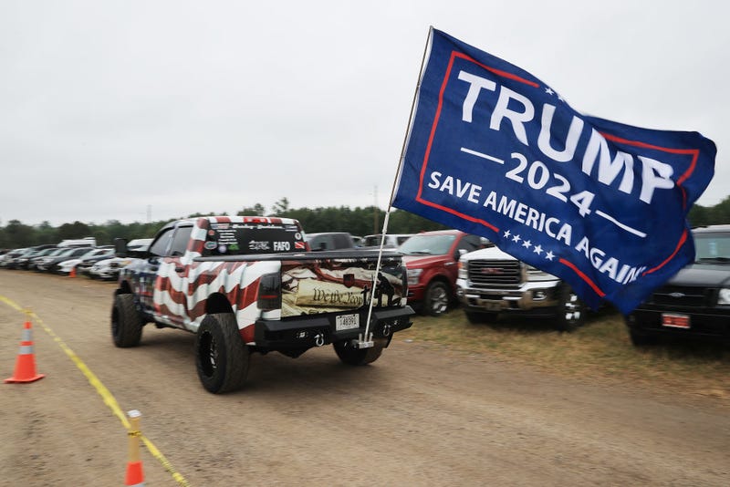 A truck with a 'Trump 2024' flag arrives at a "Save America" rally with former President Donald Trump at York Family Farms on August 21, 2021 in Cullman, Alabama.