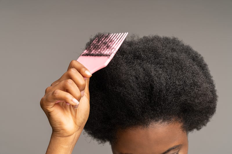 Person comes through their hair