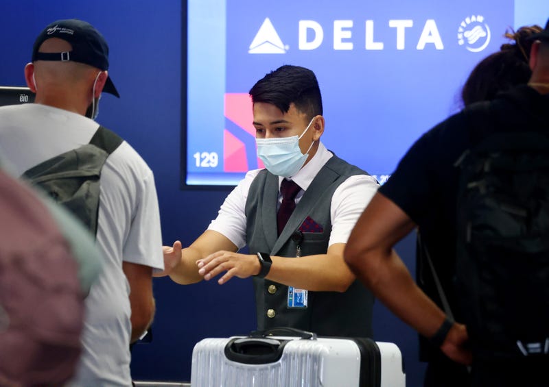 A Delta Air Lines employee works on the departures level at LAX.