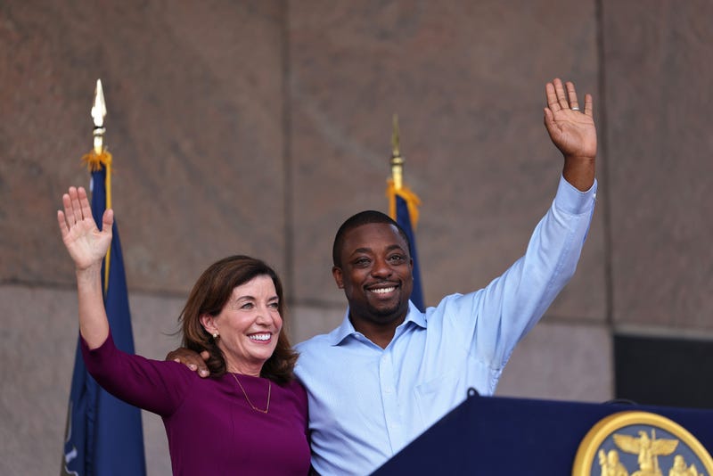 New York Gov. Kathy Hochul and State Senator Brian Benjamin wave at the crowd during a press conference announcing him as her Lt. Governor on August 26, 2021 in New York City