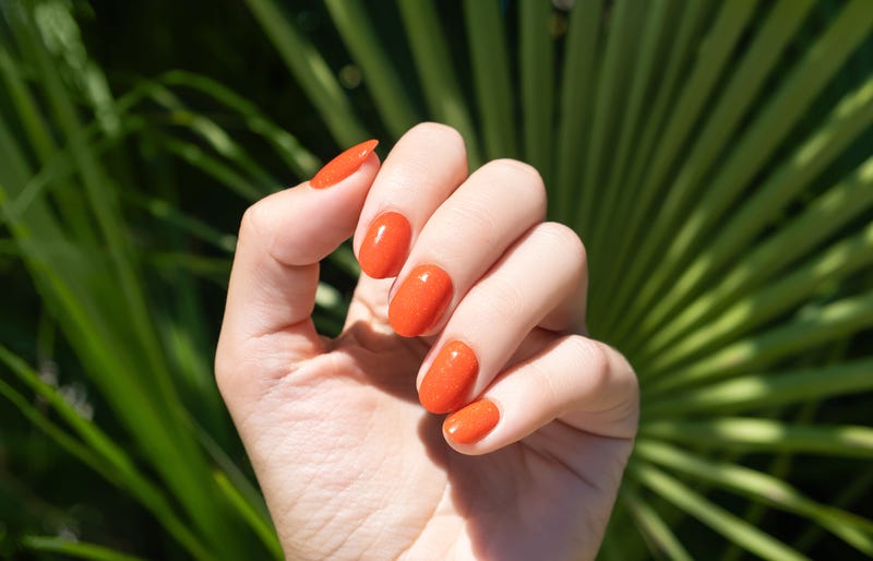  Orange nail polish manicure