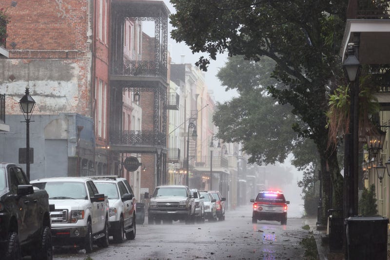 A police car cruises through the French Quarter during Hurricane Ida on August 29, 2021 in New Orleans, Louisiana. Ida made landfall earlier today southwest of New Orleans. (Photo by Scott Olson/Getty Images)