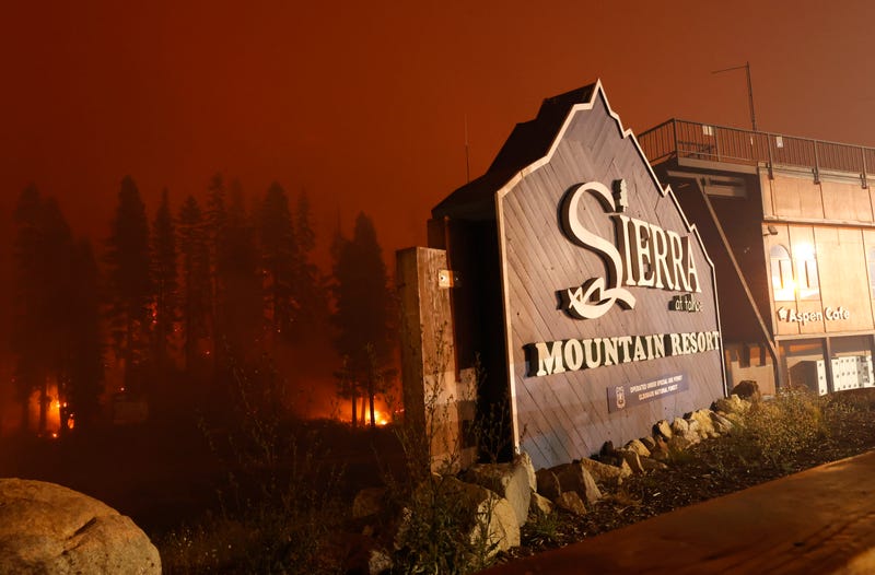 The Caldor Fire burns in trees at the Sierra-at Tahoe ski resort on August 30, 2021 in Twin Bridges, California.