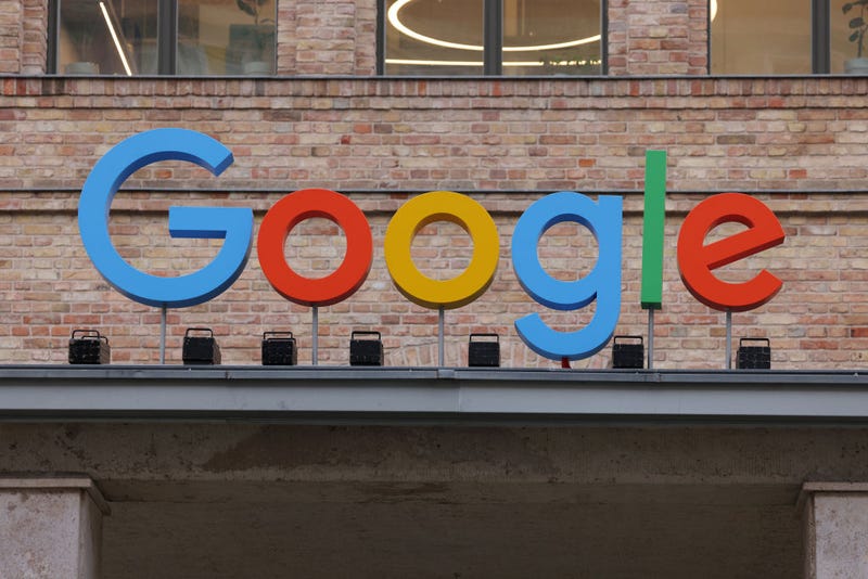 The Google corporate logo hangs outside the Google Germany offices on August 31, 2021 in Berlin, Germany.