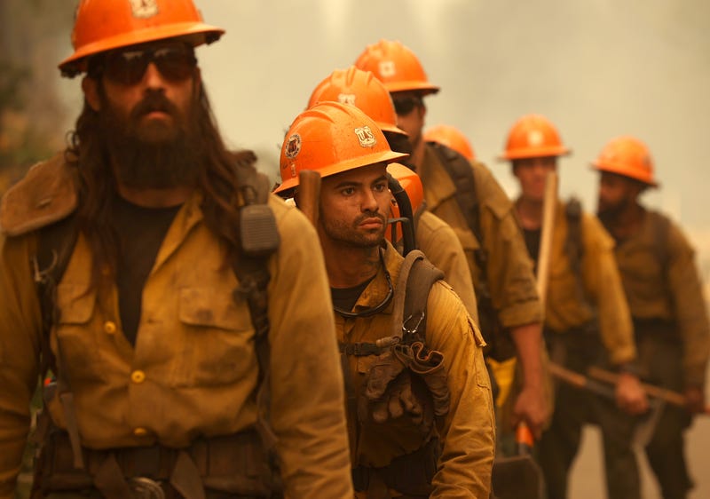 firefighters walking in a line