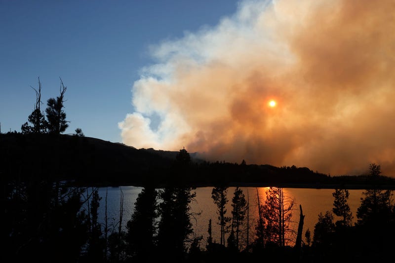 The sun is blocked by smoke from the Caldor Fire as it burns near Caples Lake on August 31, 2021 in Kirkwood, California.