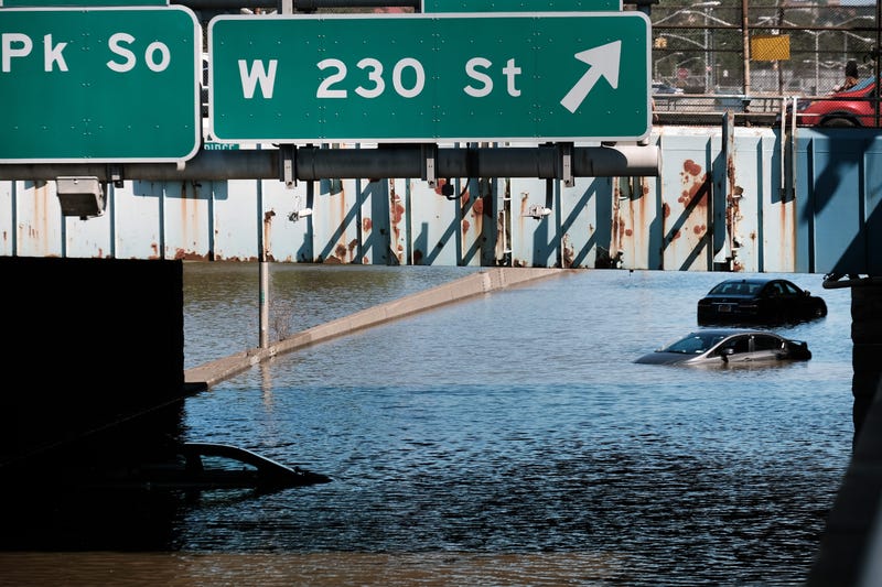 Cars sit abandoned on a flooded highway following a night of extremely heavy rain from the remnants of Hurricane Ida on September 02, 2021 in the Bronx