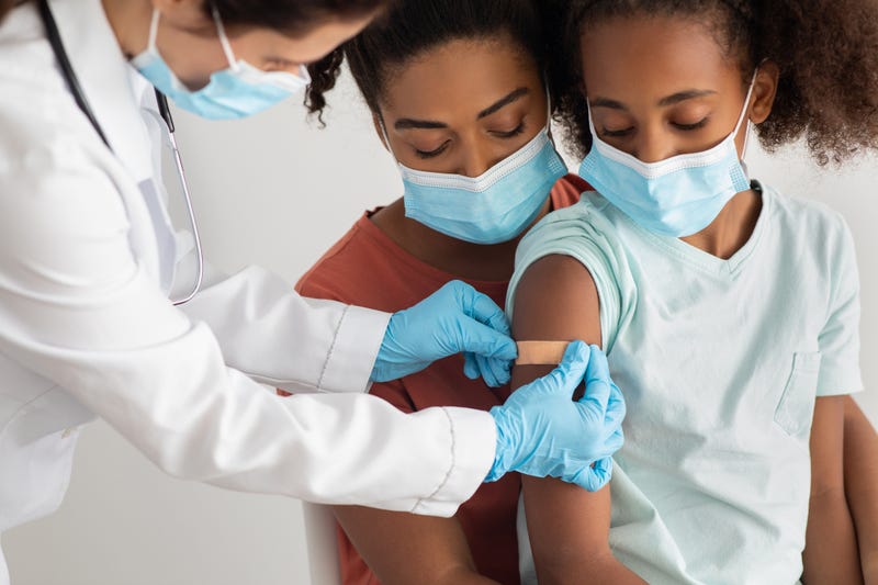 Child receiving vaccine