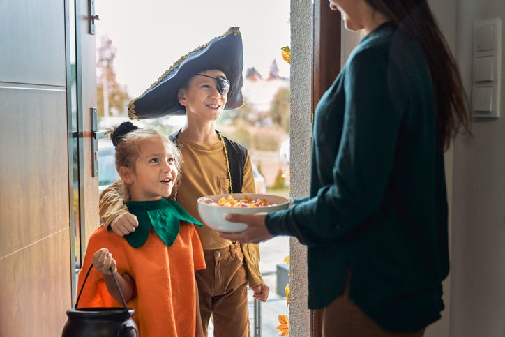 Handing Out Candy On Halloween