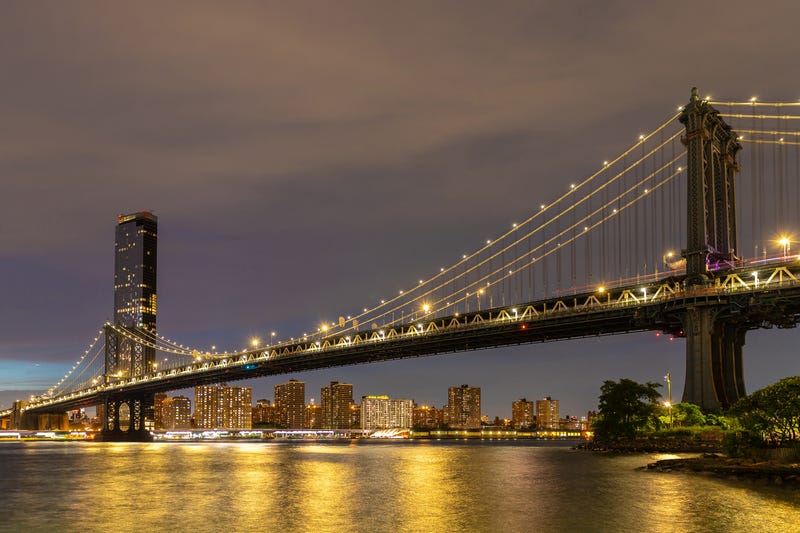 A man plunged to his death on the Manhattan side of the Manhattan Bridge on Tuesday morning as he tried to flee a car crash, police said