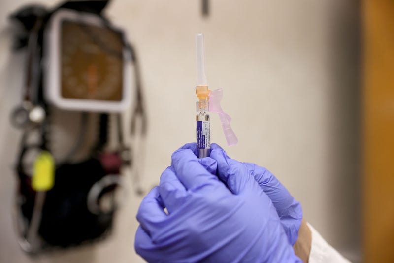 Susana Sanchez, a Nurse Practitioner, prepares to administer a flu vaccination at a CVS pharmacy and MinuteClinic on September 10, 2021 in Miami, Florida. 