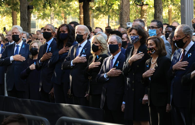 Former President Bill Clinton, former First Lady Hillary Clinton, former President Barack Obama, former First Lady Michelle Obama, President Joe Biden, First Lady Jill Biden, former New York City Mayor Michael Bloomberg, Bloomberg's partner Diana Taylor, Speaker of the House Nancy Pelosi (D-CA) and Senate Minority Leader Charles Schumer (D-NY) stand for the national anthem during the annual 9/11 Commemoration Ceremony at the National 9/11 Memorial and Museum on September 11, 2021 in New York City