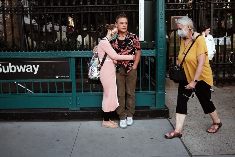 People gather in lower Manhattan near Ground Zero as the city commemorates the 20th anniversary of the September 11th terrorist attacks on the World Trade Center on September 11, 2021 in New York City. 