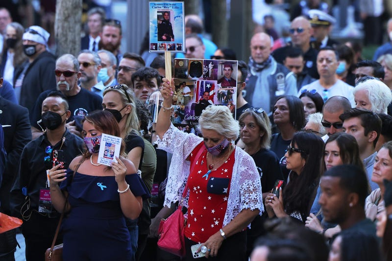 People attend the annual 9/11 Commemoration Ceremony at the National 9/11 Memorial and Museum on September 11, 2021 in New York City