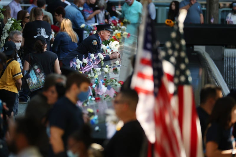 Family, friends and colleagues of those killed in the 9/11 and the 1993 bombing terror attacks participate in the annual commemoration ceremony at the National 9/11 Memorial and Museum on September 11, 2021 in New York City.