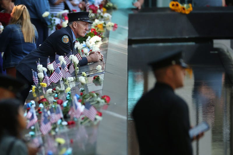 Family, friends and colleagues of those killed in the 9/11 and the 1993 bombing terror attacks participate in the annual commemoration ceremony at the National 9/11 Memorial and Museum on September 11, 2021 in New York City. 