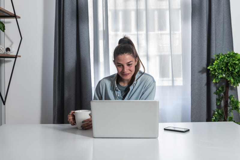 Young woman a psychotherapist doctor having online psychotherapy therapy with her patient and talk via video call on the laptop computer while she working at home in the home office