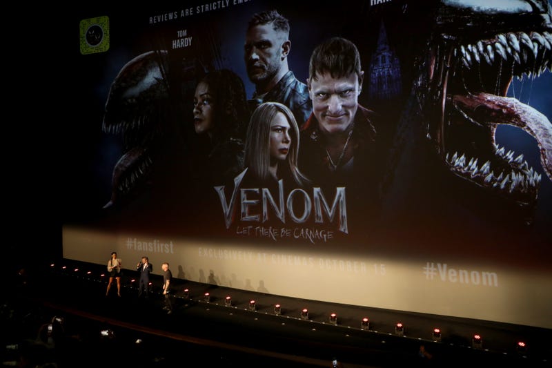 Vick Hope, Andy Serkis and Tom Hardy on stage at the fan screening of "Venom: Let There Be Carnage" at Cineworld Leicester Square on September 14, 2021 in London, England.